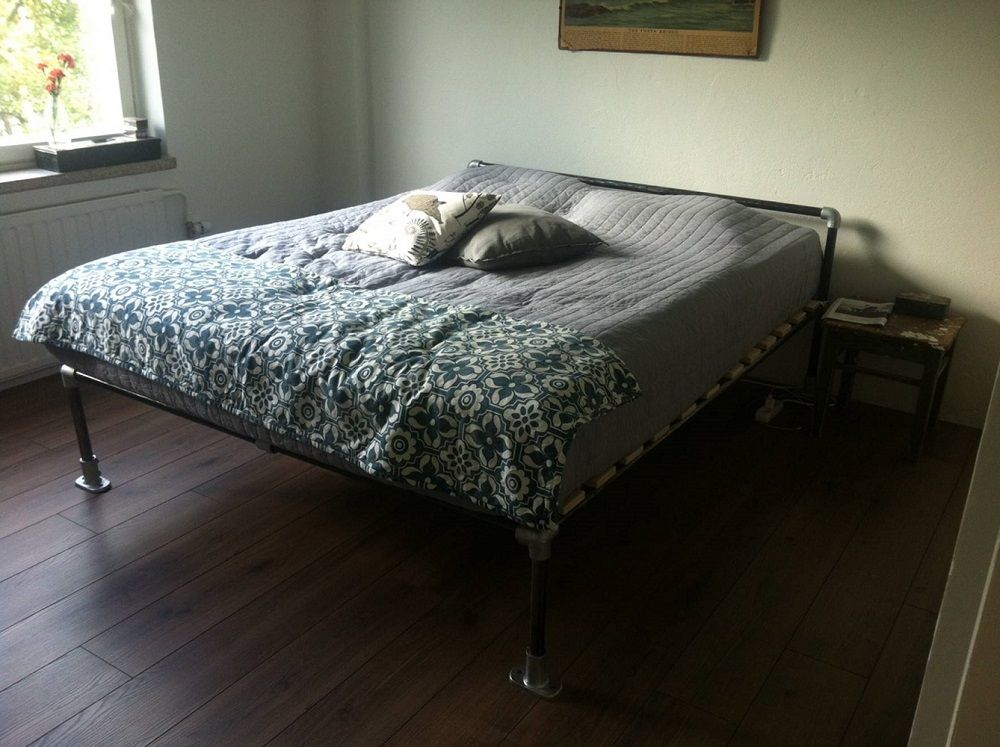 A bed made of FastClamp handrail fittings and galvanised tubes