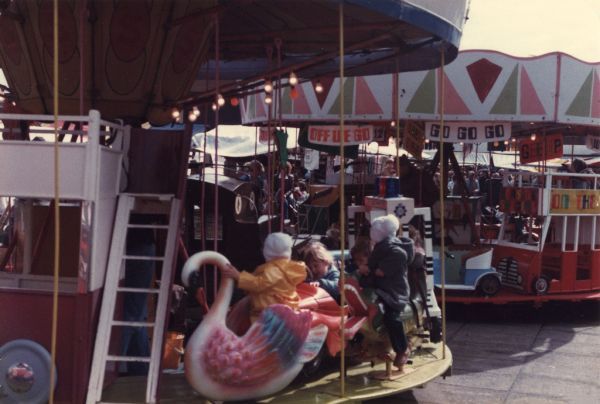 Children's roundabout rides at Ashton-under-Lyne outdoor market