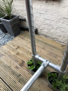 The galvanised tube and fittings base of our outdoor bar.