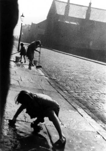 Cleaning doorsteps and surrounding stonework with Donkey stones