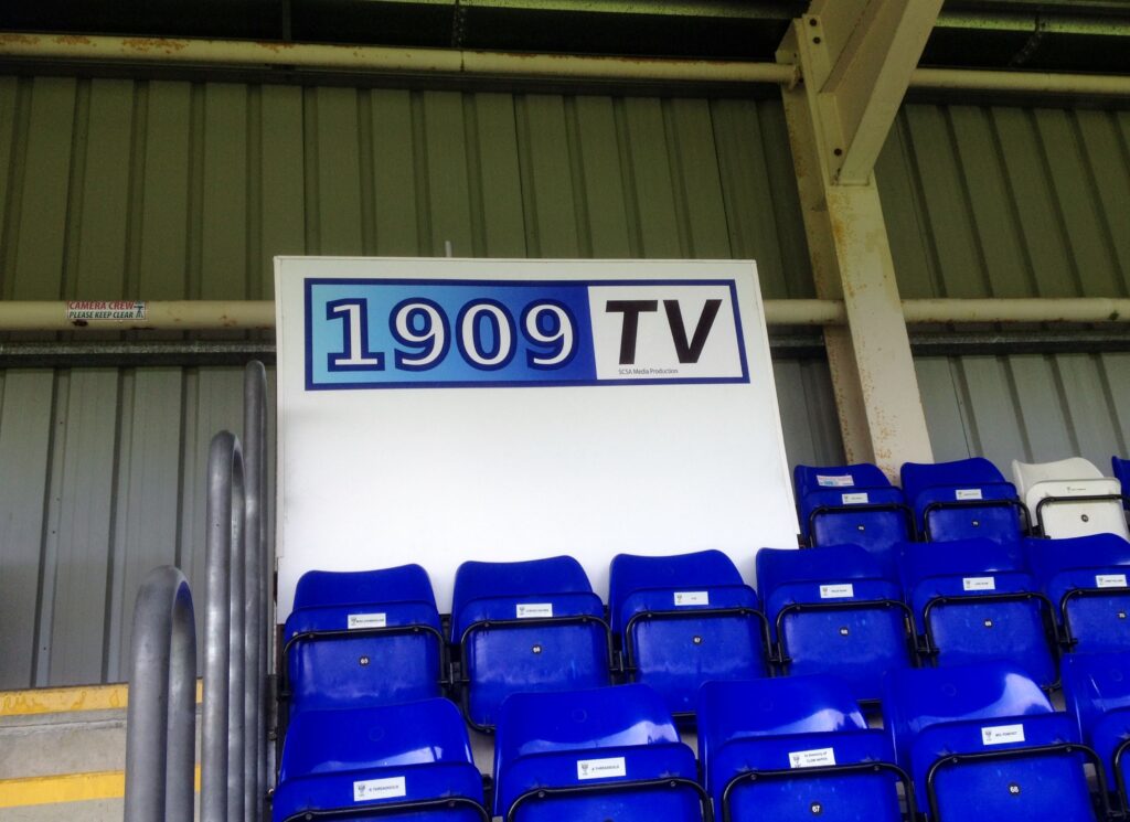 An advertising board built using FastClamp handrail and fittings