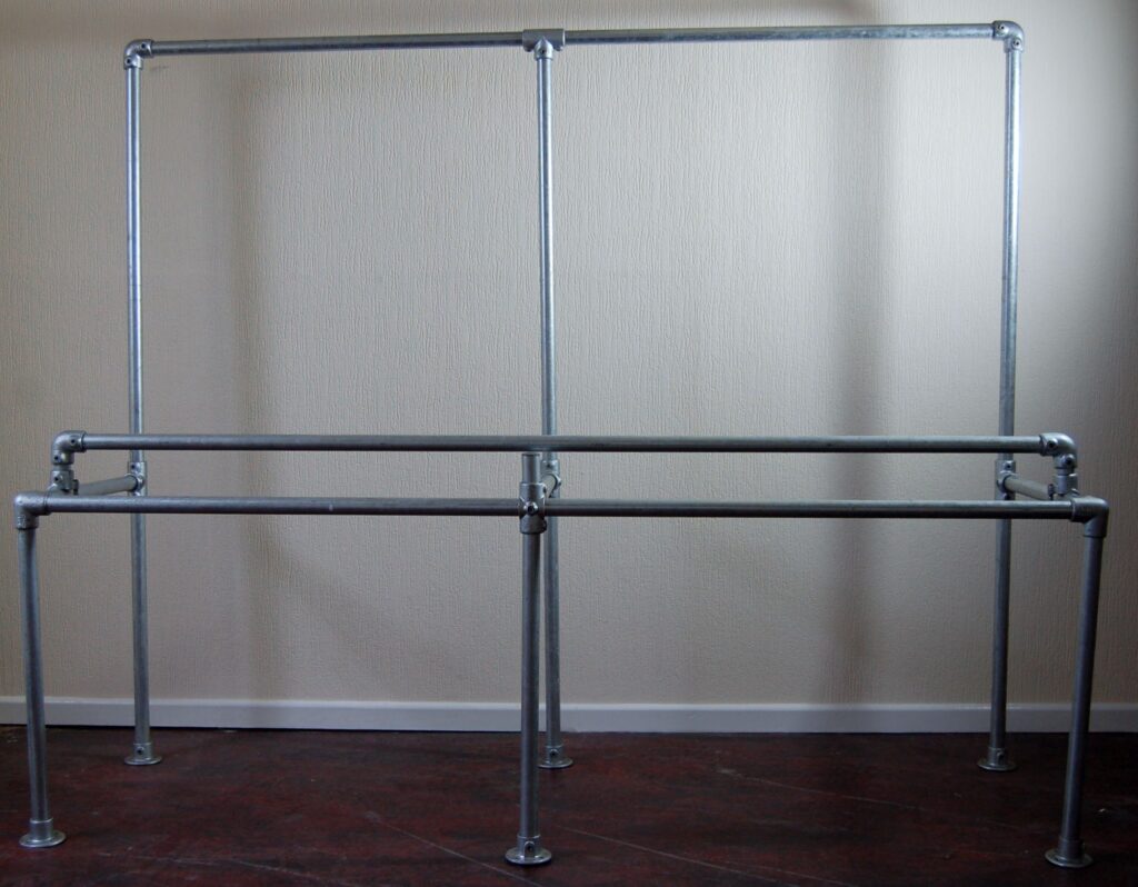 An industial clothes rail made of FastClamp handrail fittings