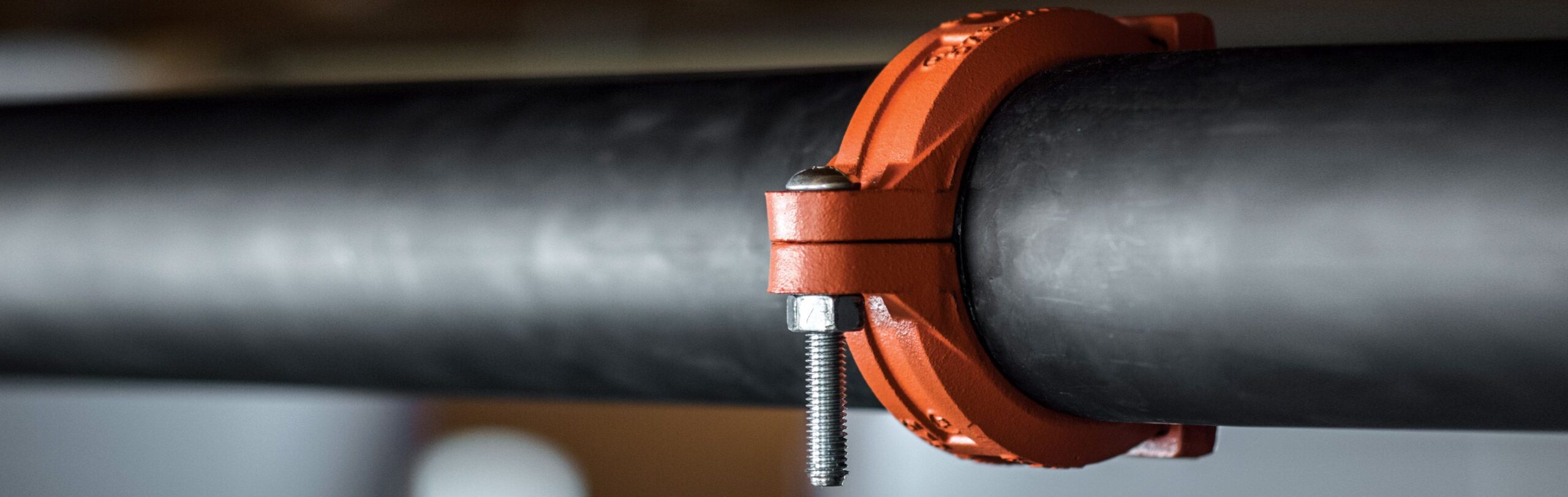 Steel pipe and a grooved coupling