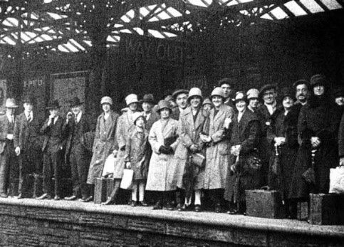 People in the 1920s heading off on the Wakes week holiday by train.