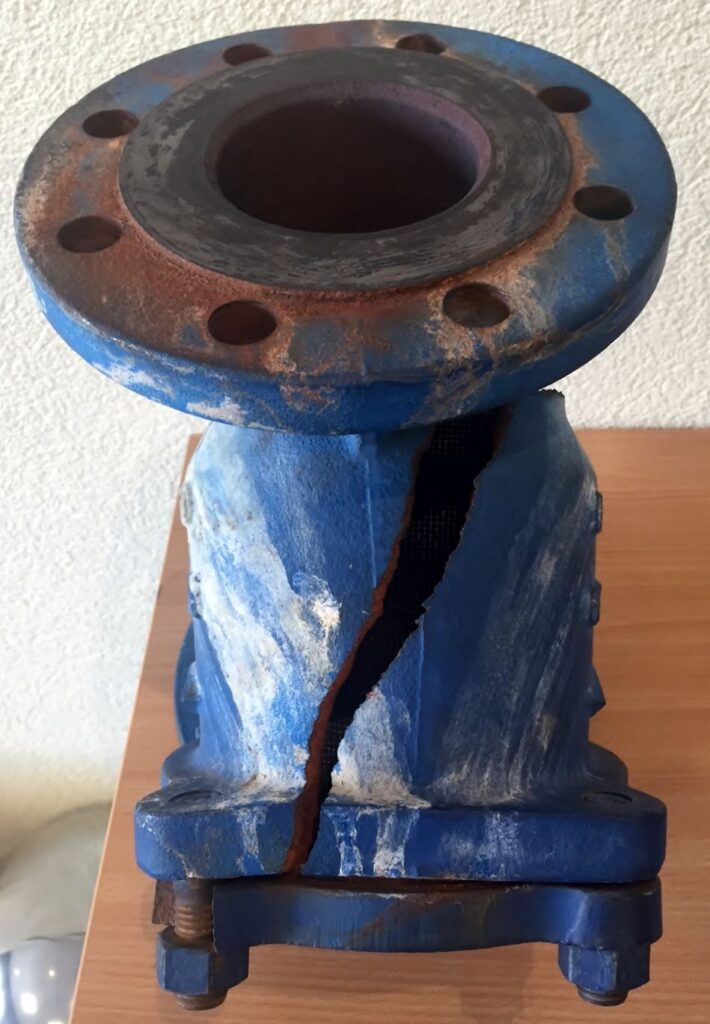 A strainer damaged by water hammer.